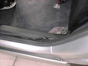 Fitting The Cables2.jpg - Most of the excess cabling went behind the glove box to and backwards down the side of the car and into the boot